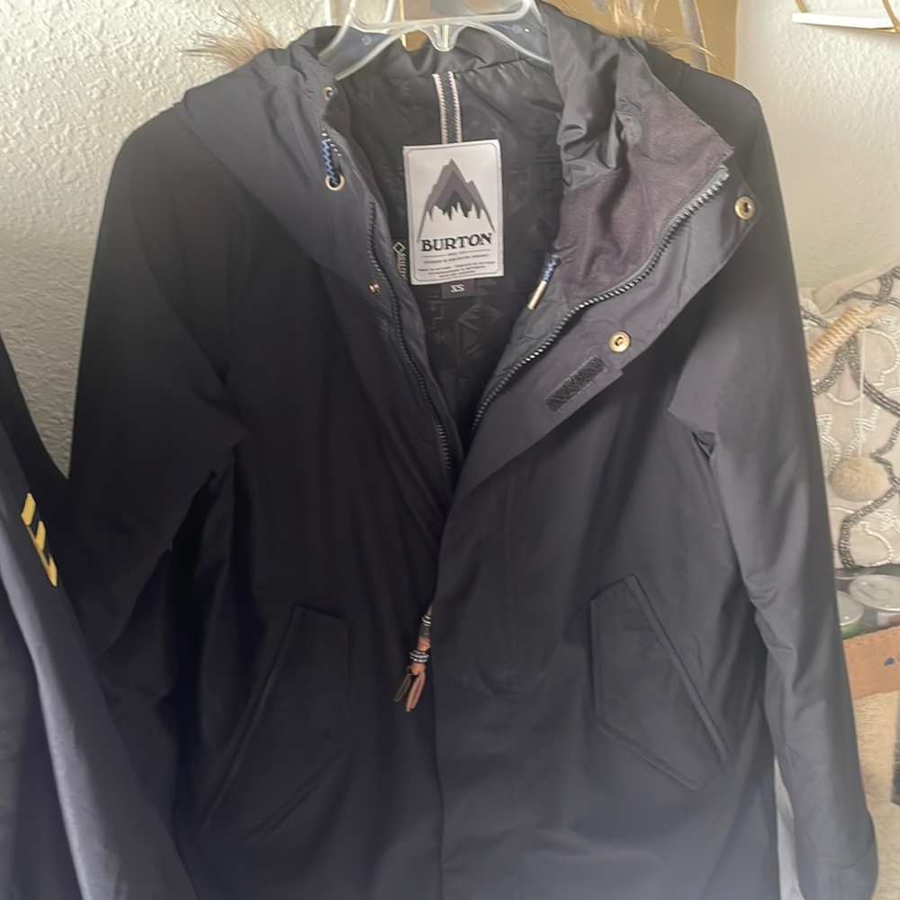 Black Burton snow jacket worn once pretty much brand new. Have boots too